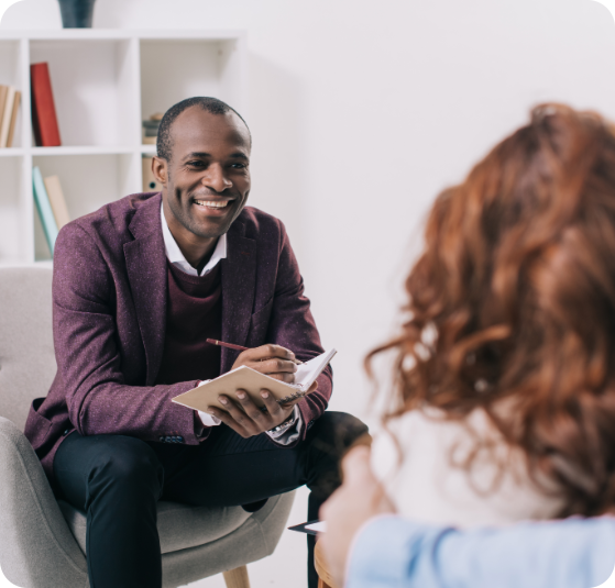 A therapist talking with his patient